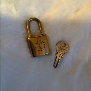 Authentic LV lock & key .. reposhing..